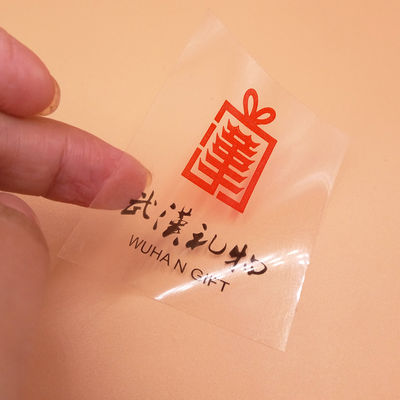 Étiquettes d'étiquettes de logo transparentes en PVC en forme de rectangle avec estampage en feuille d'or
