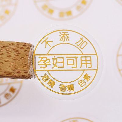 Étiquettes d'étiquettes de logo transparentes en PVC en forme de rectangle avec estampage en feuille d'or