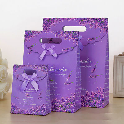 Sacs-cadeaux en papier imprimé sur mesure avec fermeture en velours