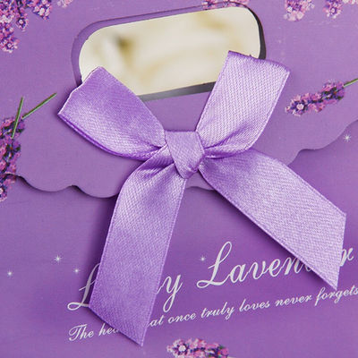 Sacs-cadeaux en papier imprimé sur mesure avec fermeture en velours