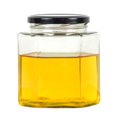 Bouteille de stockage en verre transparent hexagonal 100 ml 500 ml avec couvercle métallique pour la crème de miel