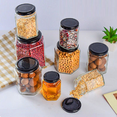 Bouteille de stockage en verre transparent hexagonal 100 ml 500 ml avec couvercle métallique pour la crème de miel